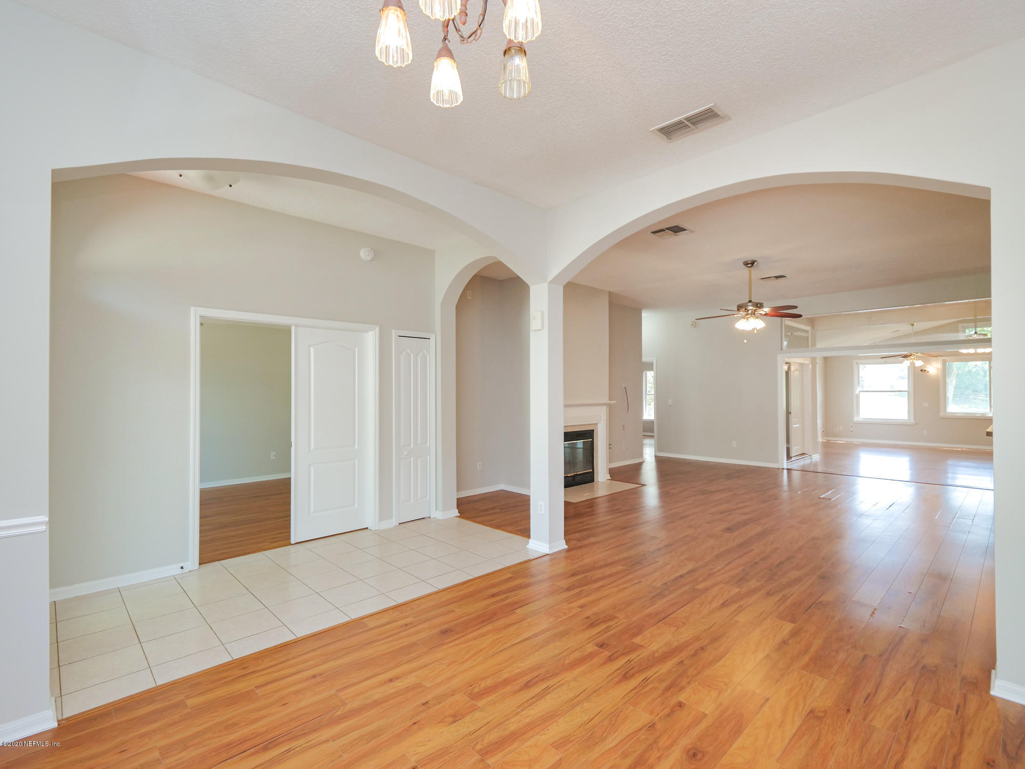 8663 Reedy Branch Drive Jacksonville, FL 32256 - Photo 7 of 33 a view of a room with wooden floor