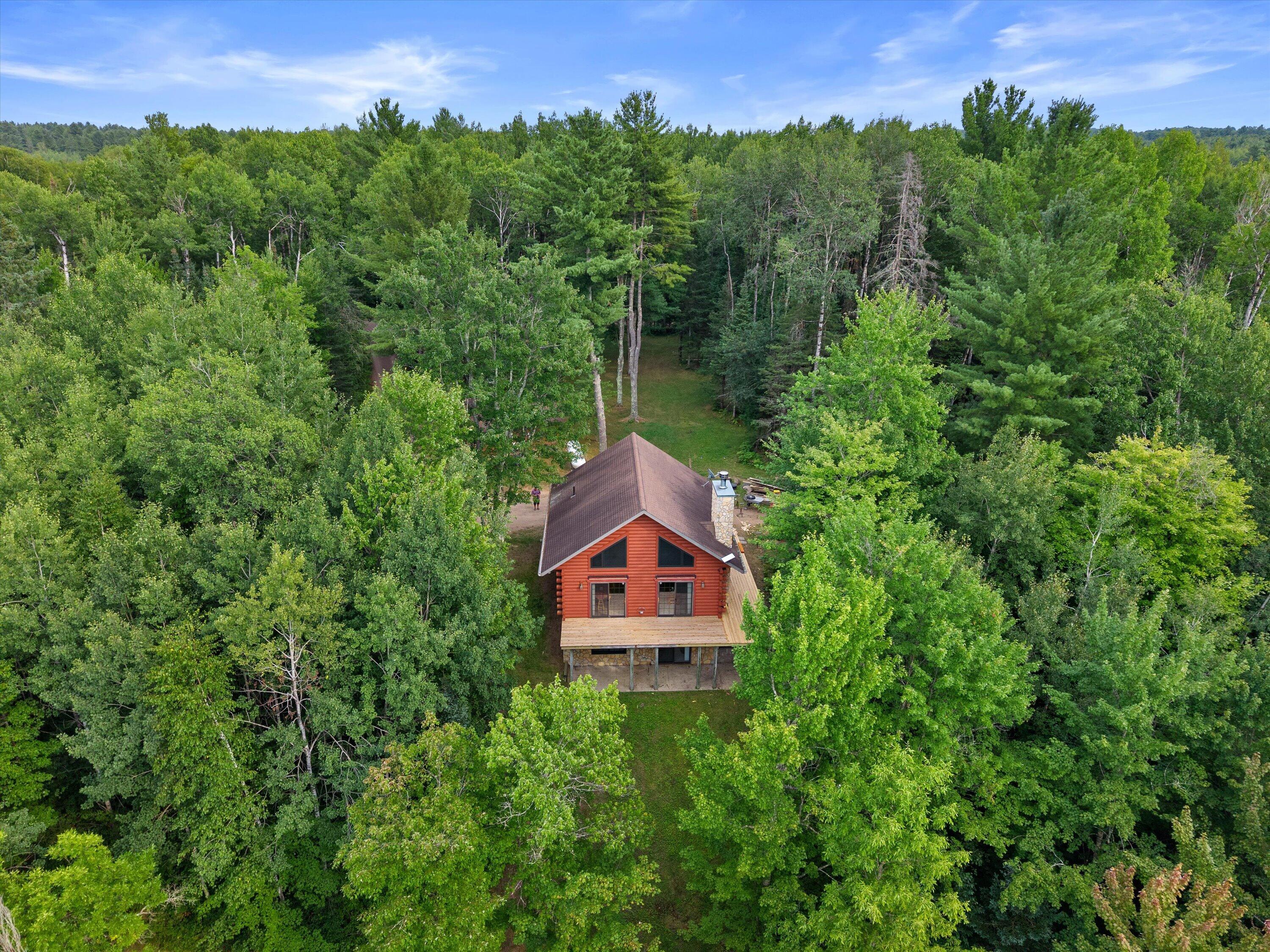 W7338 Flambeau River Road Fifield, WI 54524 - Photo 2 of 49 02-DJI_20260813164308_0006_D