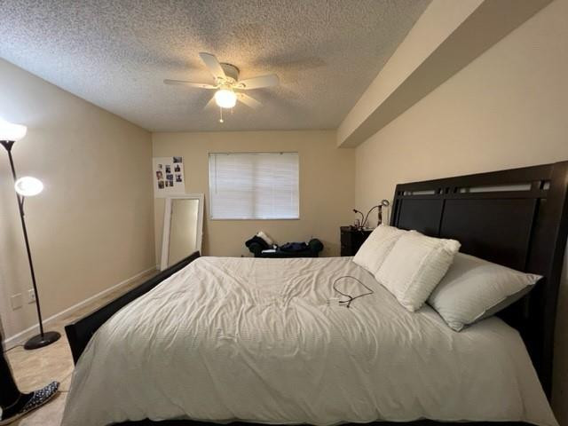 560 South Park Road, Unit 147 Hollywood, FL 33021 - Photo 7 of 16 a bedroom with a bed and window