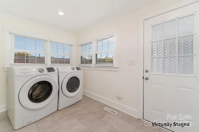 a utility room with dryer and washer