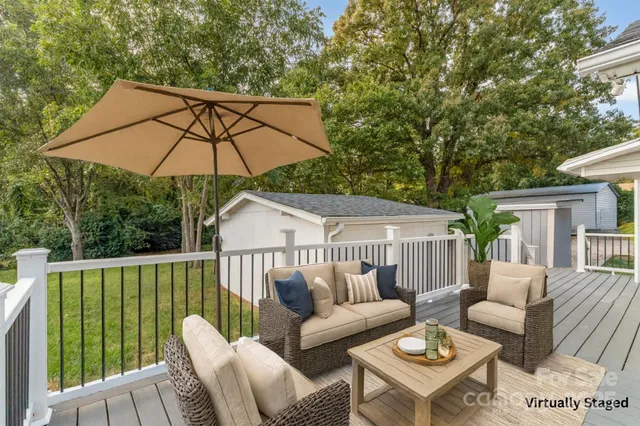 a view of a patio on the deck in the backyard