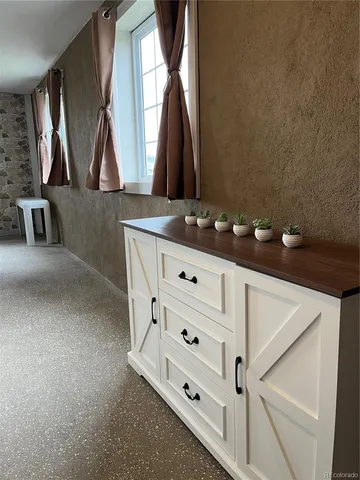 a bathroom with a double vanity sink and mirror