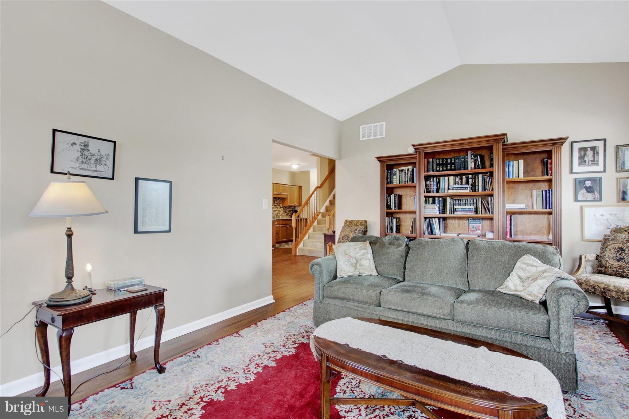 31 Ivy Lane Gettysburg, PA 17325 - Photo 19 of 31 a living room with furniture and a bookshelf