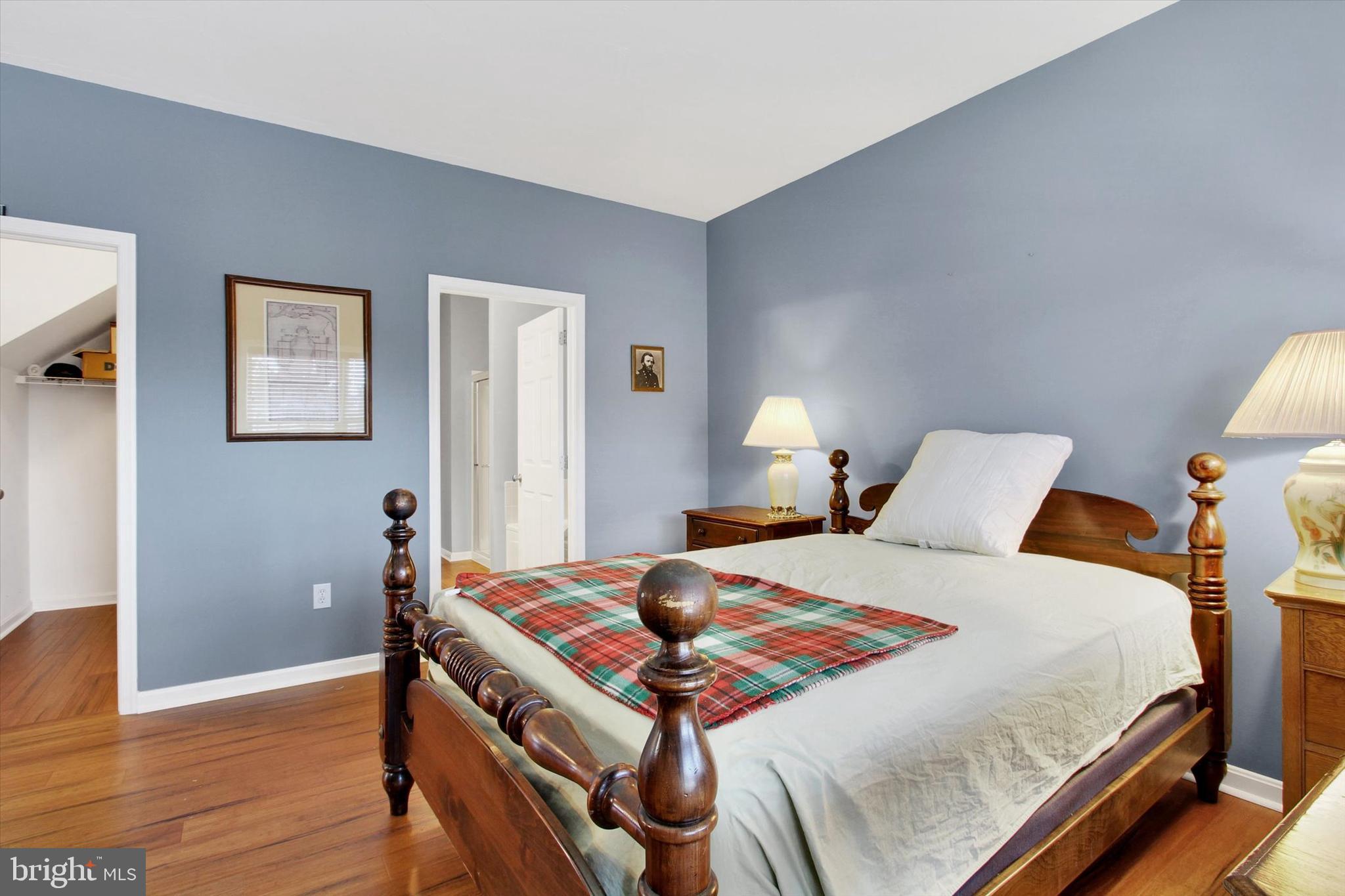 31 Ivy Lane Gettysburg, PA 17325 - Photo 21 of 31 a bedroom with a bed and wooden floor