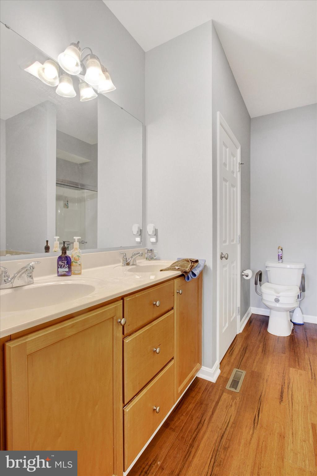 31 Ivy Lane Gettysburg, PA 17325 - Photo 22 of 31 a spacious bathroom with a double vanity sink and a mirror