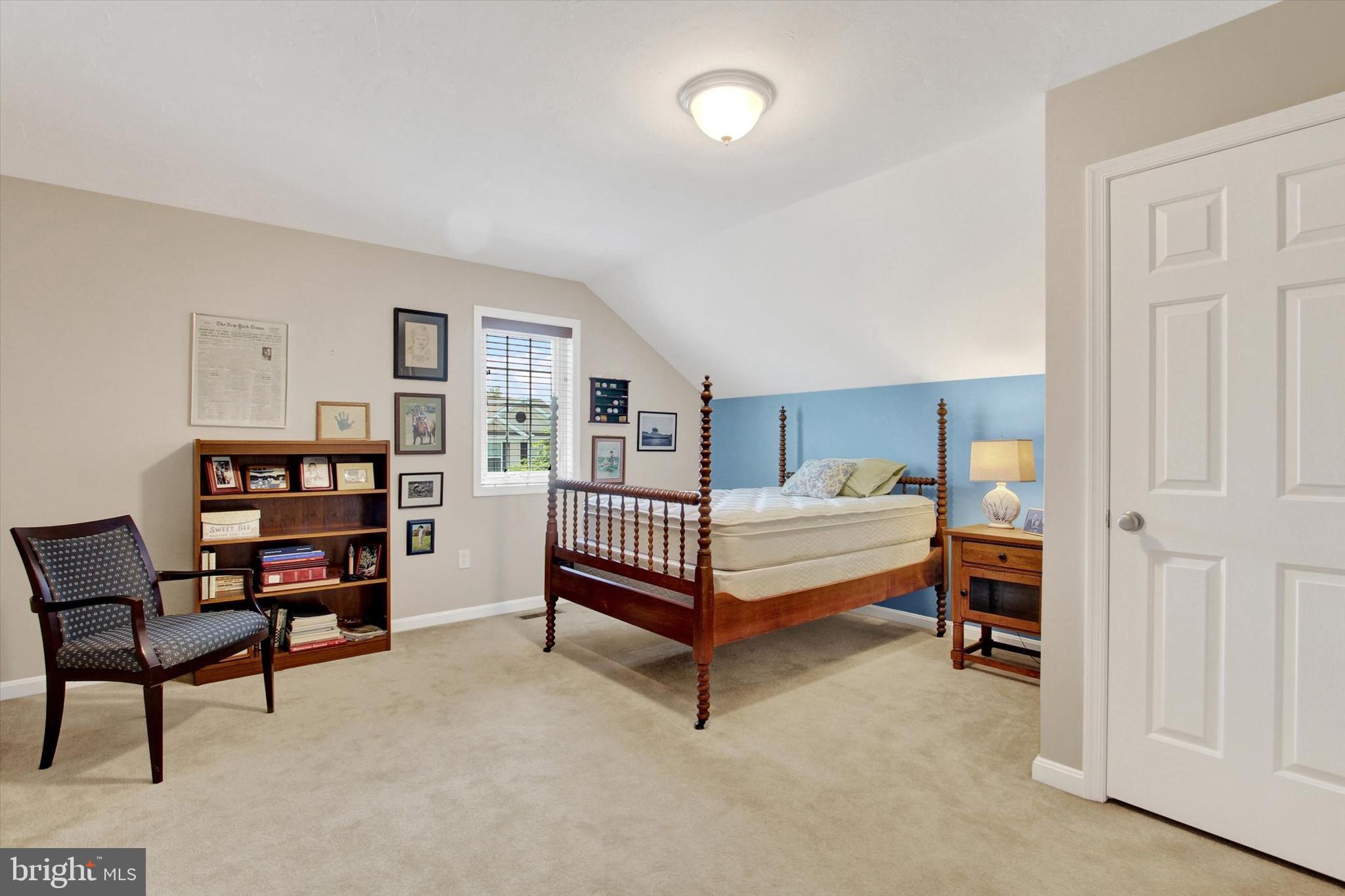 31 Ivy Lane Gettysburg, PA 17325 - Photo 28 of 31 a bedroom with furniture and a book shelf