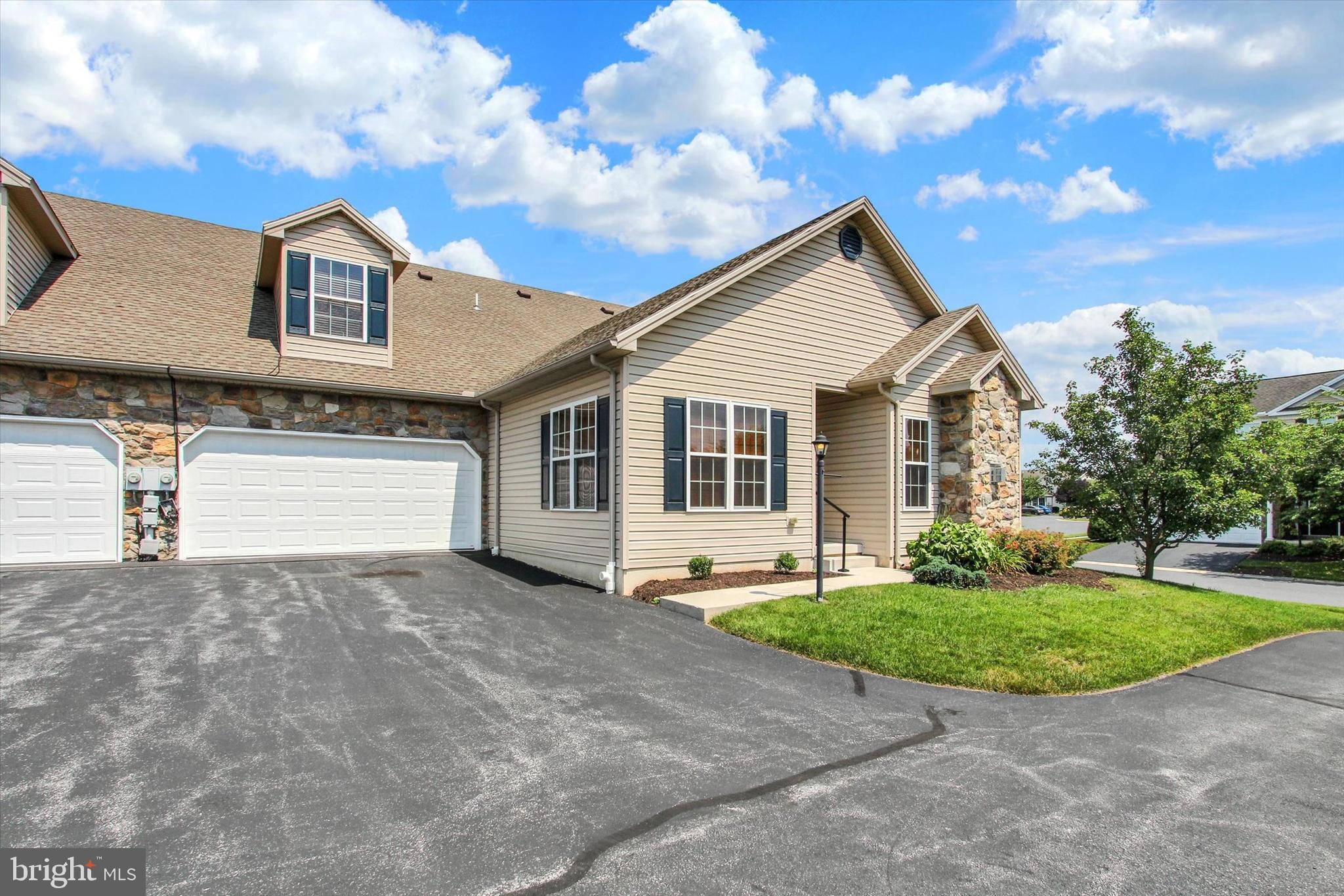 31 Ivy Lane Gettysburg, PA 17325 - Photo 3 of 31 a front view of a house with a yard and garage