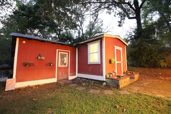 a view of a workspace with furniture