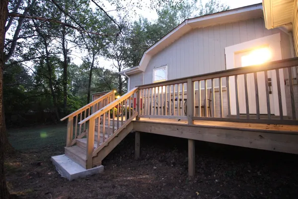 a view of deck with a yard