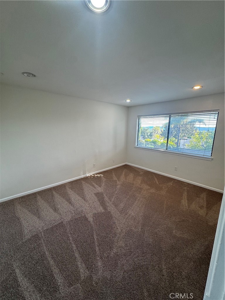 11445 Etiwanda Avenue Porter Ranch, CA 91326 - Photo 18 of 28 en empty room with windows