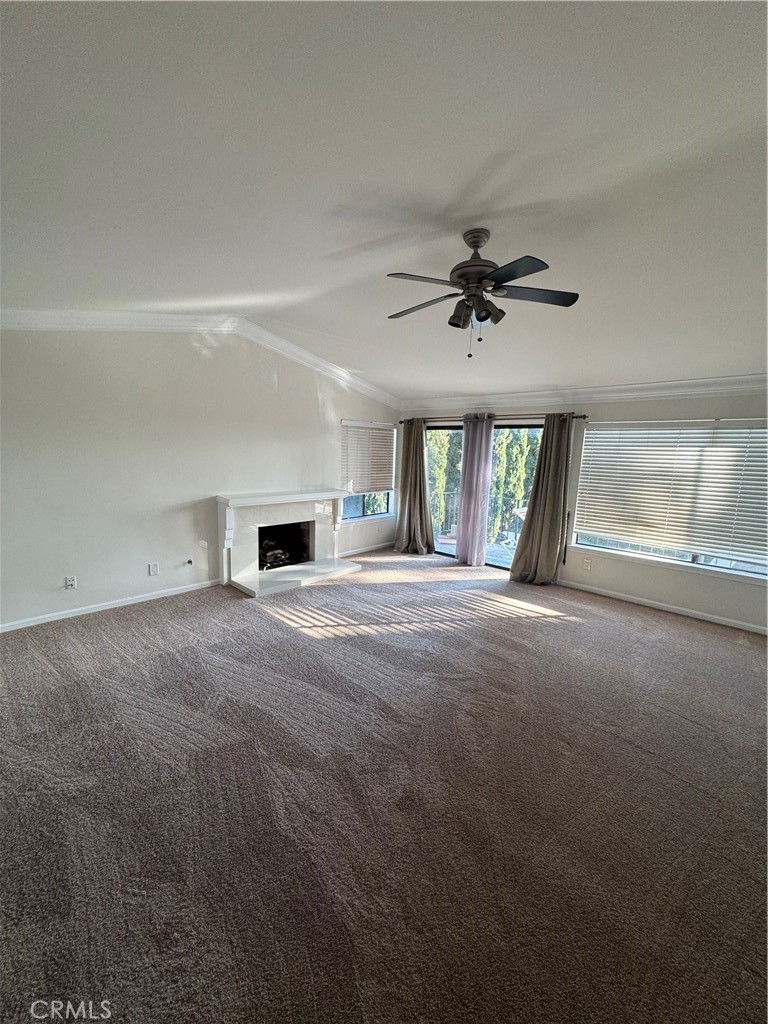11445 Etiwanda Avenue Porter Ranch, CA 91326 - Photo 19 of 28 a living room with furniture and a ceiling fan