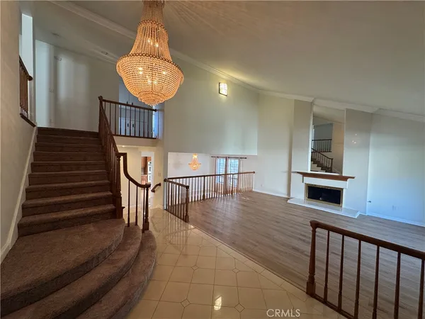 a view of a livingroom with furniture and wooden floor