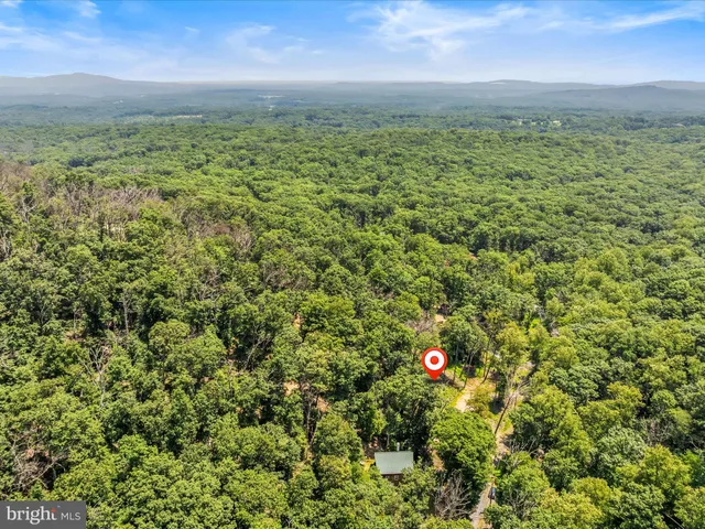 a view of a field with an outdoor space