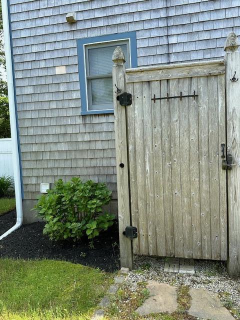 709 Old Barnstable Road Mashpee, MA 02649 - Photo 25 of 32 a view of a wooden door of the house