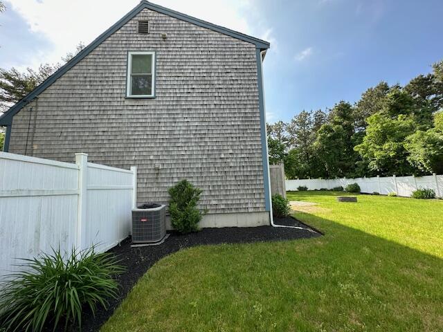 709 Old Barnstable Road Mashpee, MA 02649 - Photo 27 of 32 a view of a backyard with plants and large tree