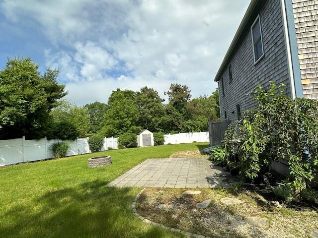 709 Old Barnstable Road Mashpee, MA 02649 - Photo 4 of 32 a view of a back yard of the house