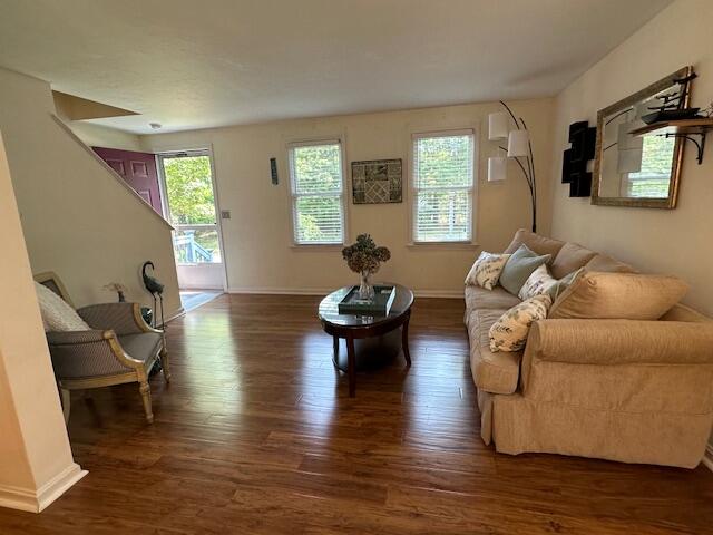 709 Old Barnstable Road Mashpee, MA 02649 - Photo 6 of 32 a living room with fireplace furniture and a wooden floor