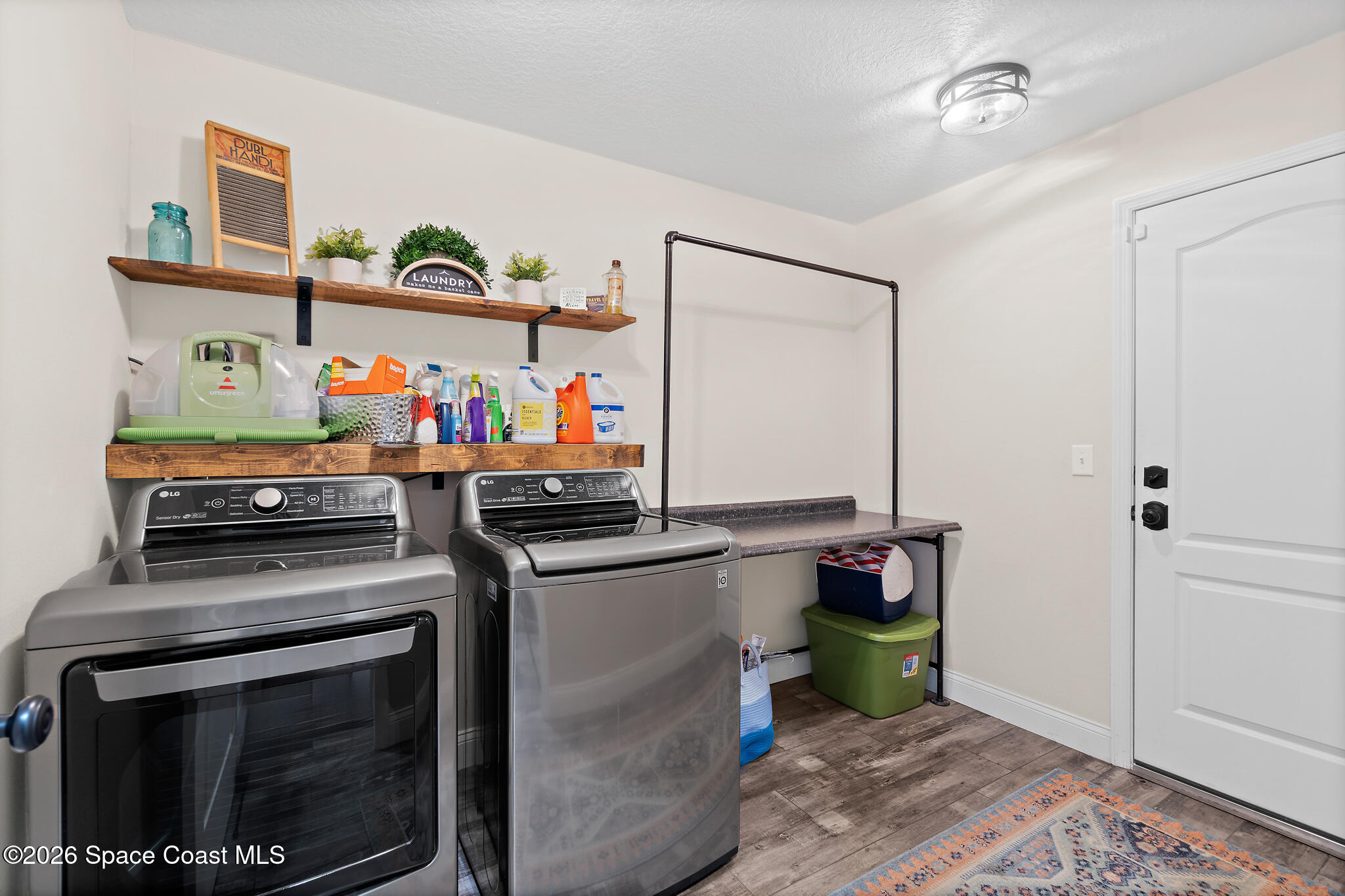 3440 Hammock Road Mims, FL 32754 - Photo 41 of 59 a kitchen with stainless steel appliances a stove and a cabinets