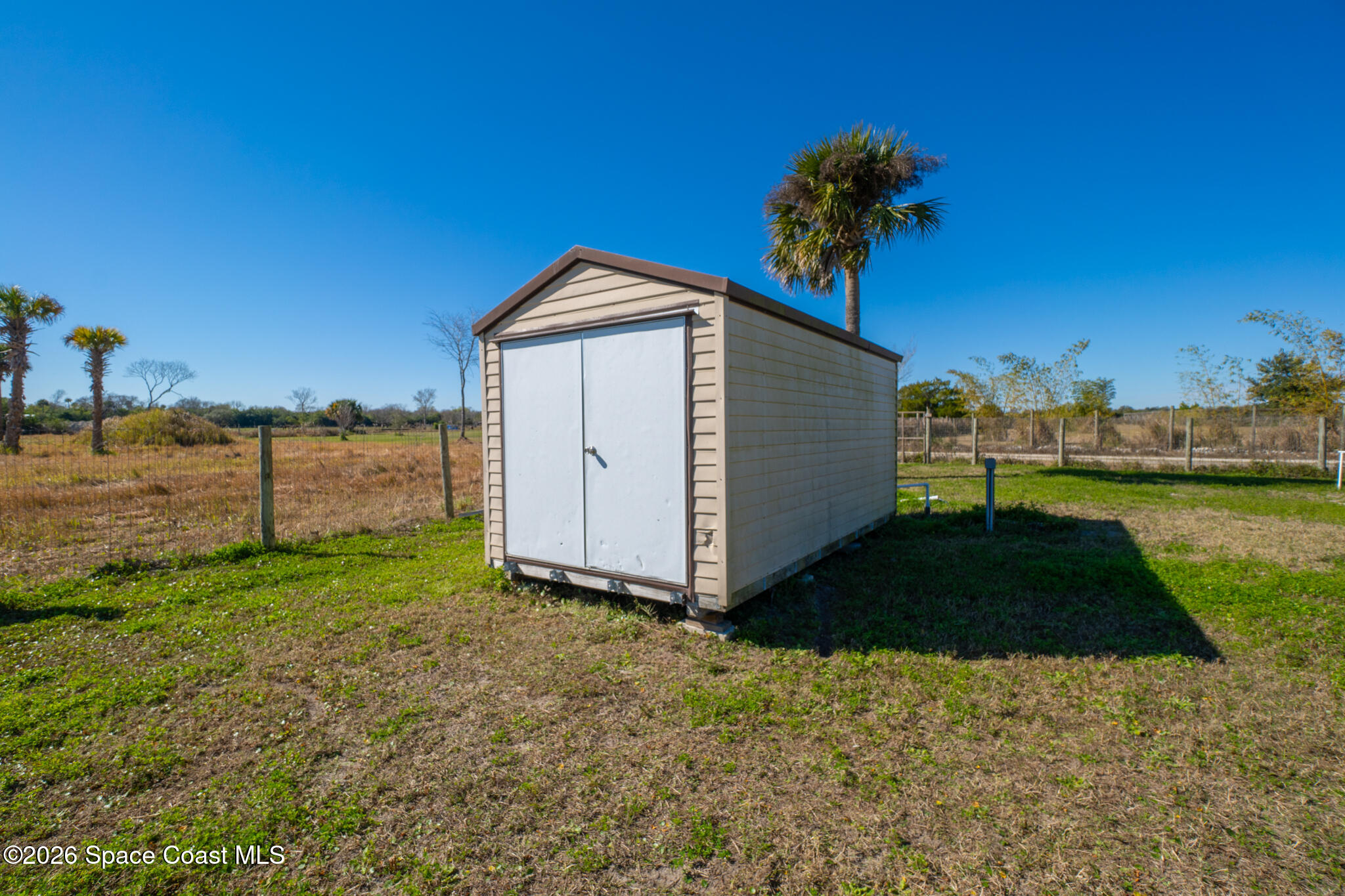3440 Hammock Road Mims, FL 32754 - Photo 43 of 59 a view of a house with backyard and garden