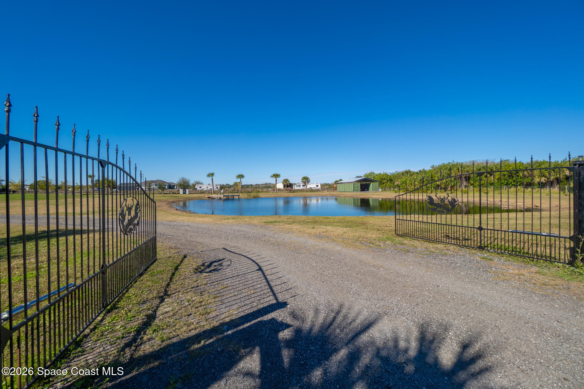 3440 Hammock Road Mims, FL 32754 - Photo 47 of 59 a view of a swimming pool and a yard