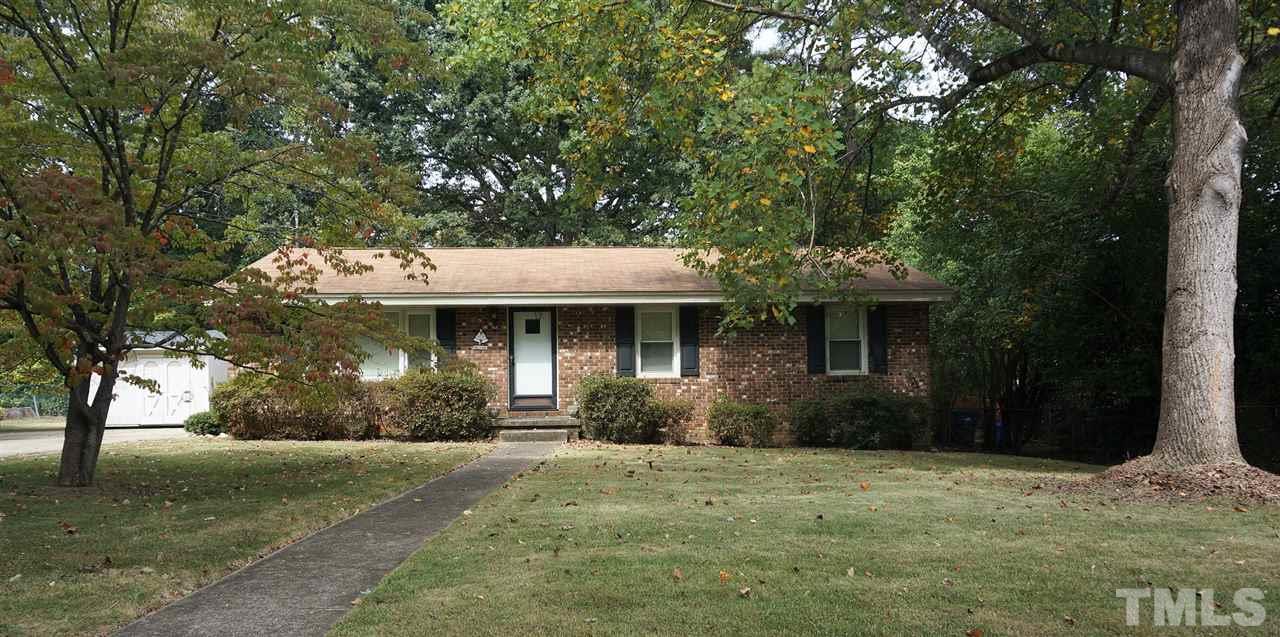 2613 Ramsey Road Raleigh, NC 27604 - Photo 2 of 23 a front view of a house with a garden