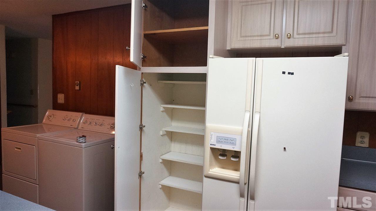 2613 Ramsey Road Raleigh, NC 27604 - Photo 18 of 23 a utility room with dryer and washer