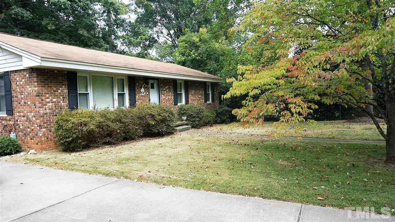 2613 Ramsey Road Raleigh, NC 27604 - Photo 20 of 23 a front view of a house with garden