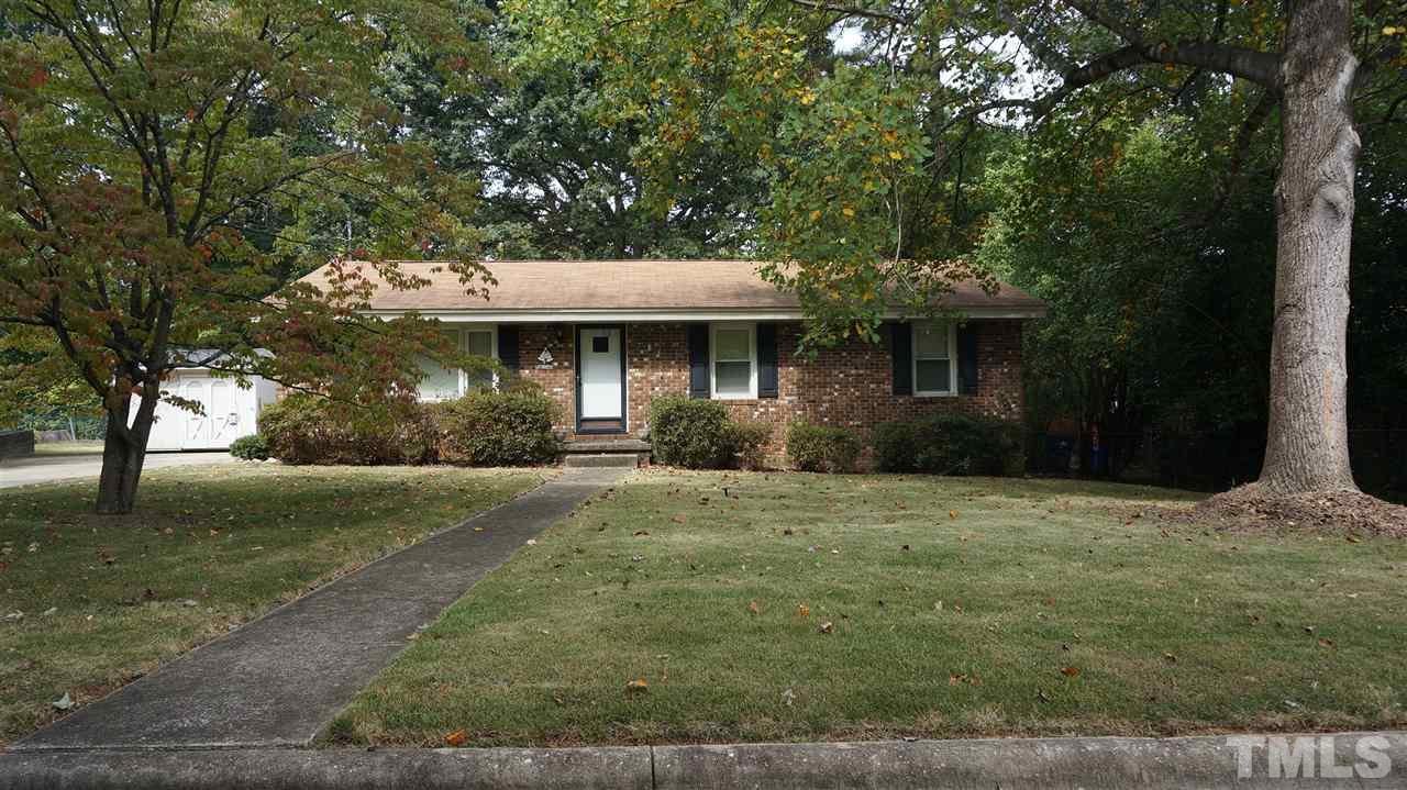 2613 Ramsey Road Raleigh, NC 27604 - Photo 3 of 23 a front view of a house with a garden