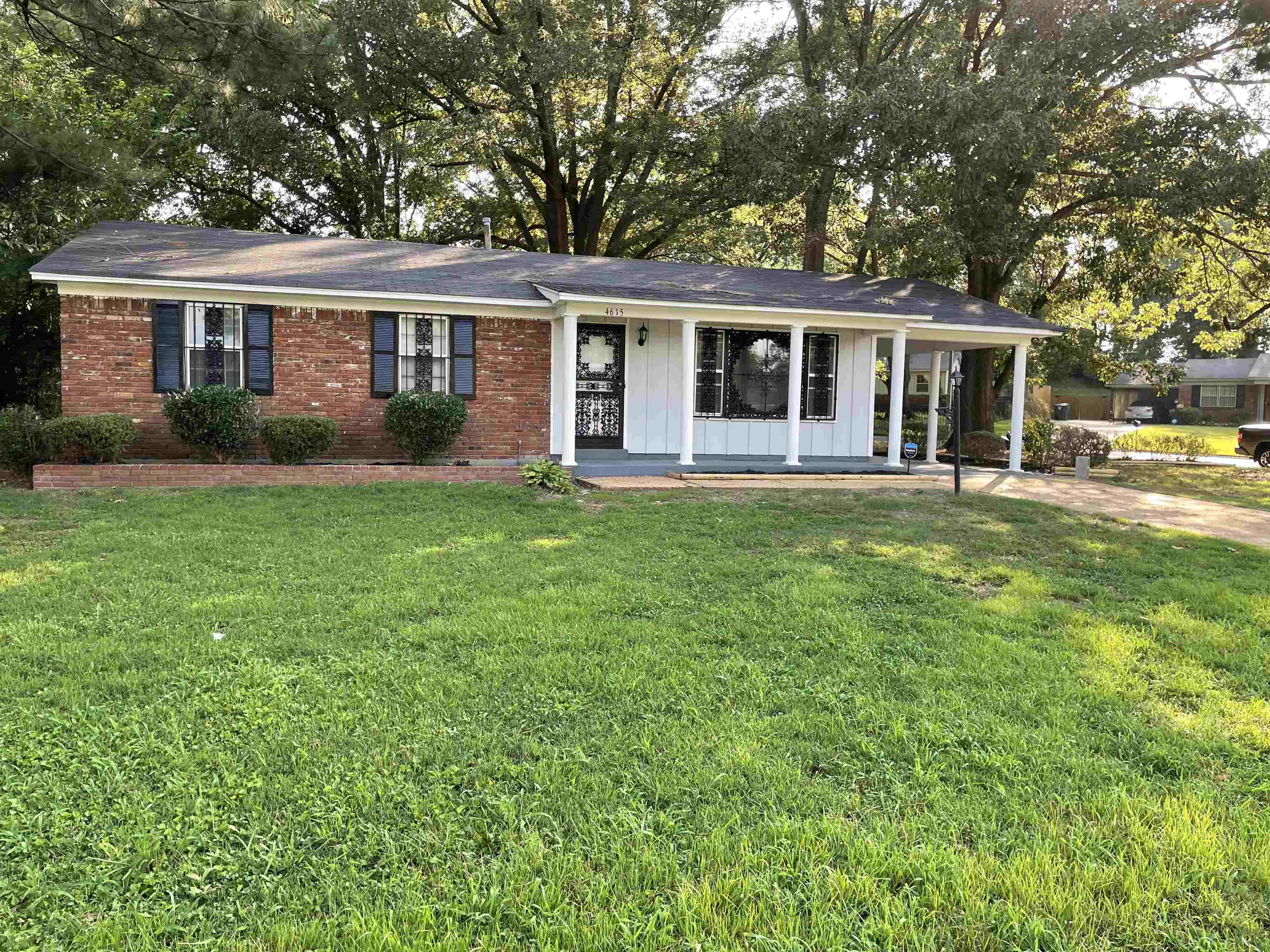 4615 Berta Road Memphis, TN 38109 - Photo 1 of 19 front view of a house with a garden