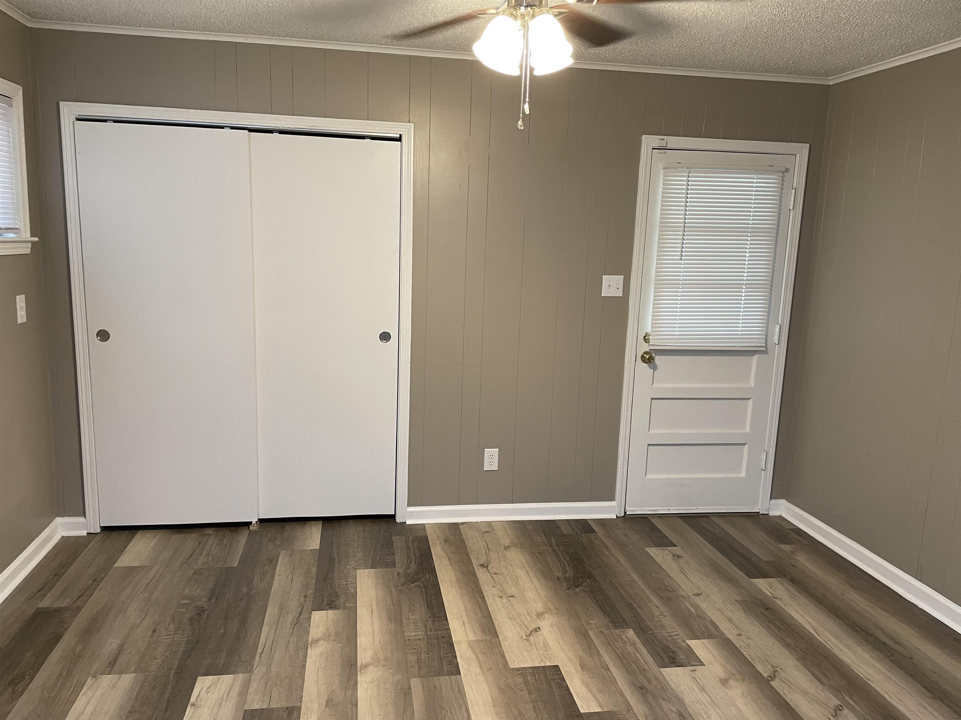 4615 Berta Road Memphis, TN 38109 - Photo 6 of 19 a view of walk in closet with empty racks