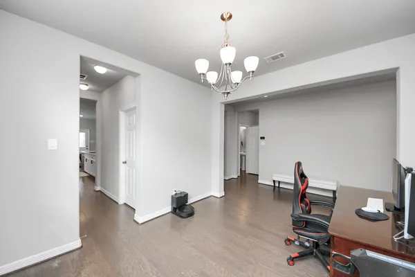 a view of a hallway with workspace