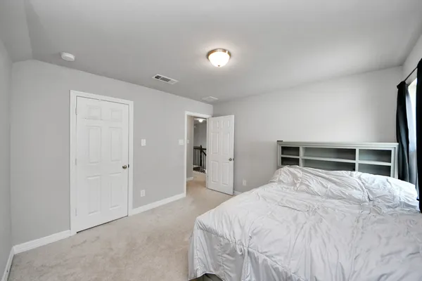 a bathroom with a sink vanity and a mirror