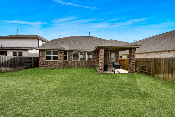 a view of outdoor space with deck and furniture