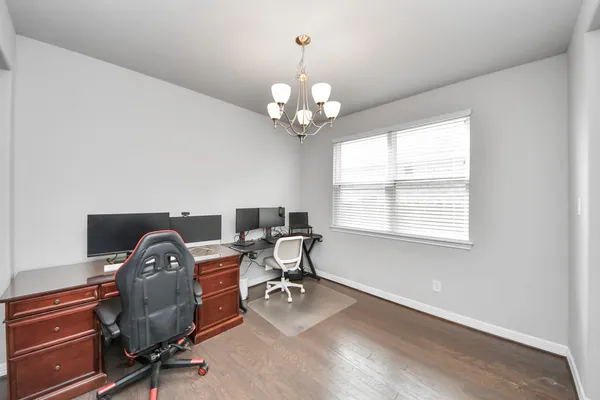 a workspace with chandelier