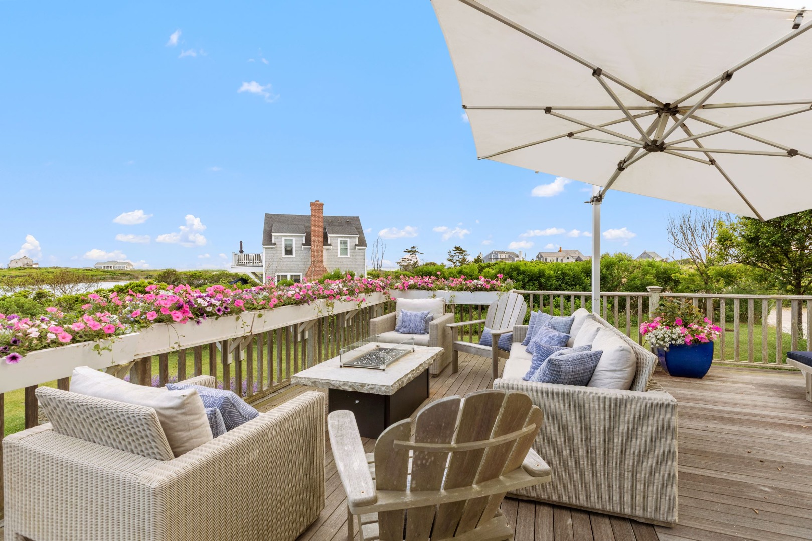 45 Starbuck Road Nantucket, MA 02554 - Photo 17 of 42 a outdoor living space with furniture and garden view
