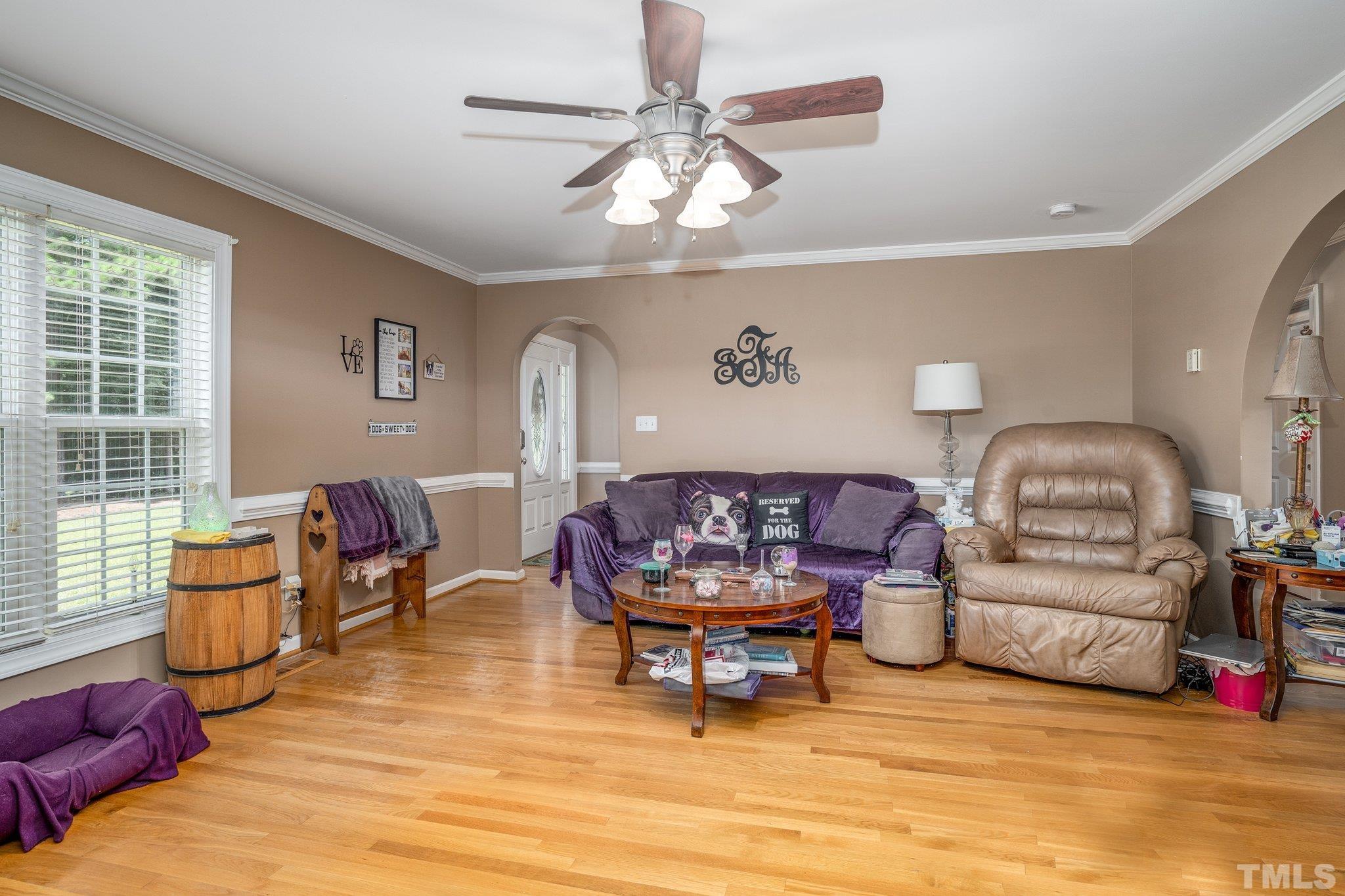 7349 Old Middlesex Road Bailey, NC 27807 - Photo 4 of 31 a living room with furniture and a flat screen tv