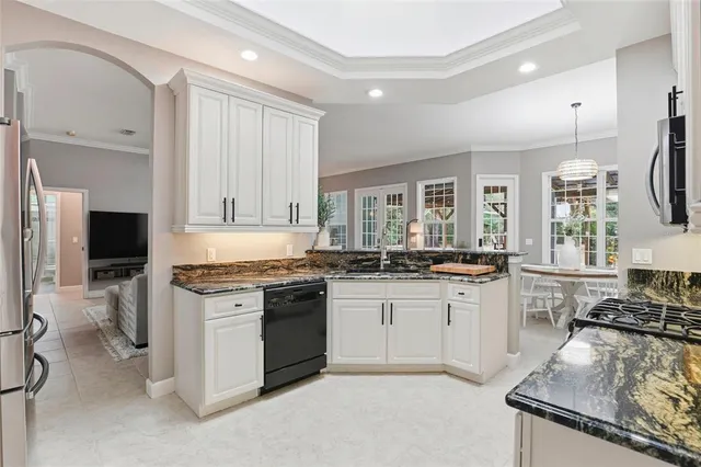 a view of a dining room with furniture window and outside view
