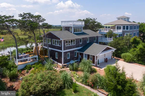 an aerial view of a house with a garden