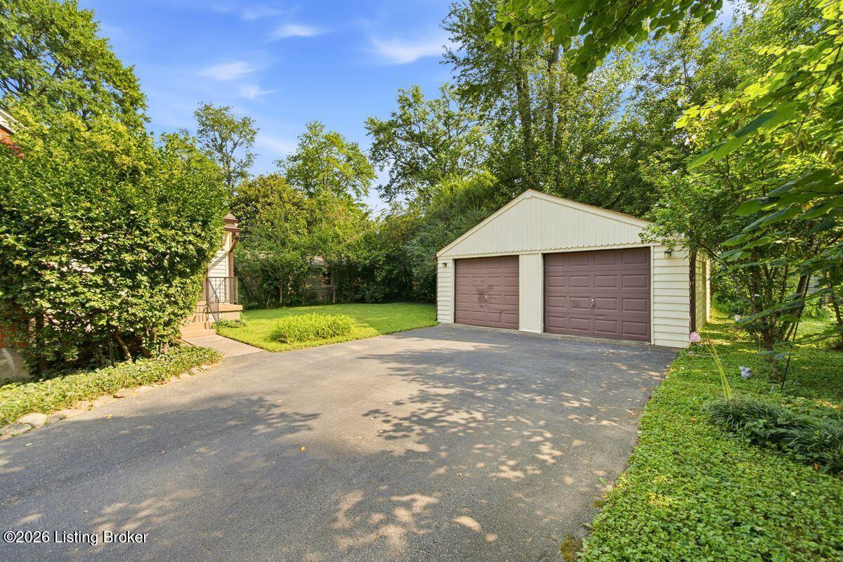 4003 Carol Road Louisville, KY 40218 - Photo 33 of 36 Double door garage, wide driveway