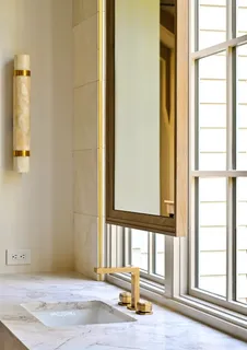 a view of a room with wooden floor closet and windows