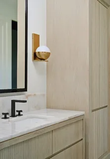 a view of a livingroom with an empty space and a window