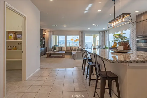 a kitchen with a stove and a sink