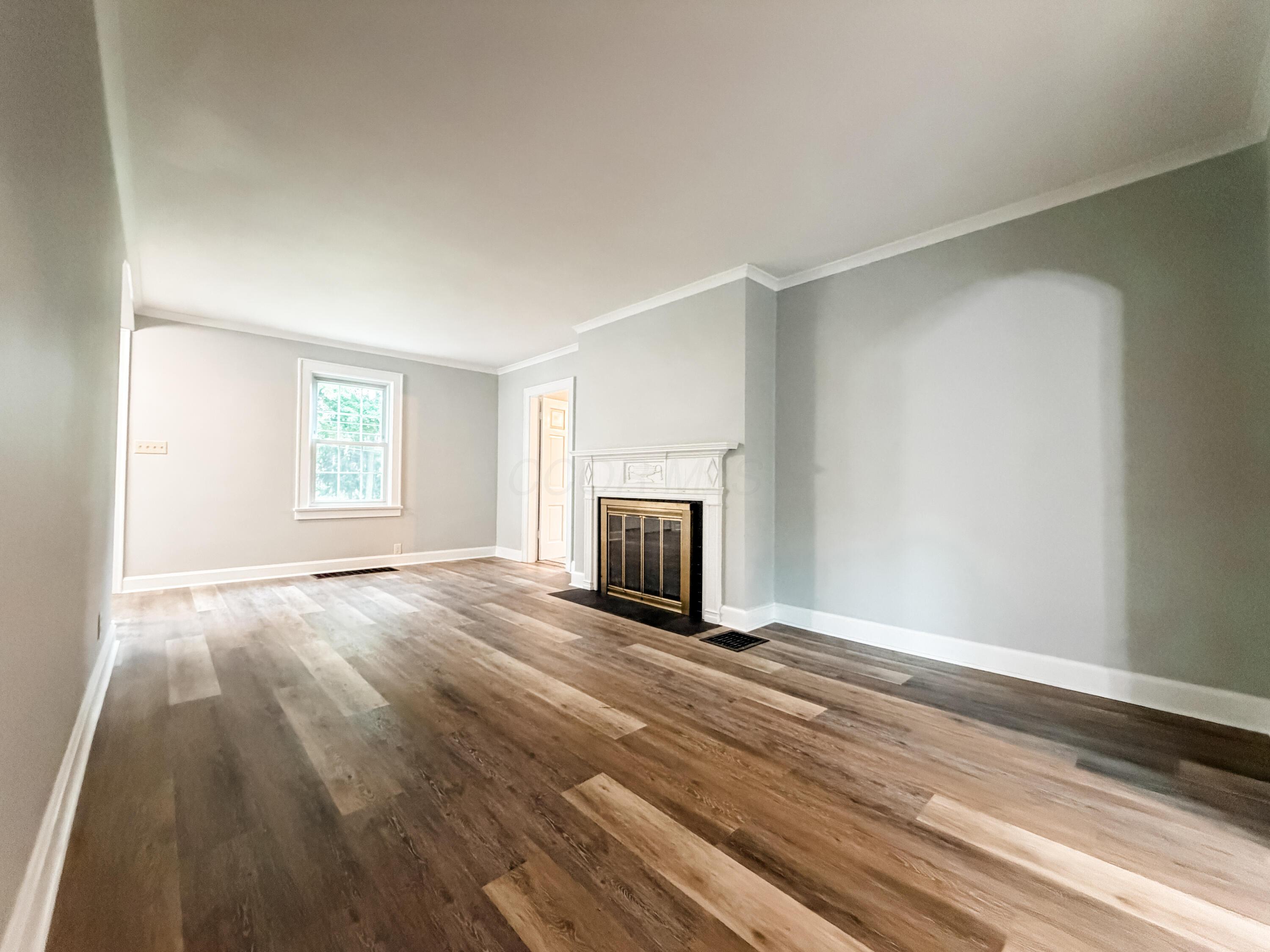 1693 Baltimore Road Northwest Lancaster, OH 43130 - Photo 7 of 38 Large living room with fireplace