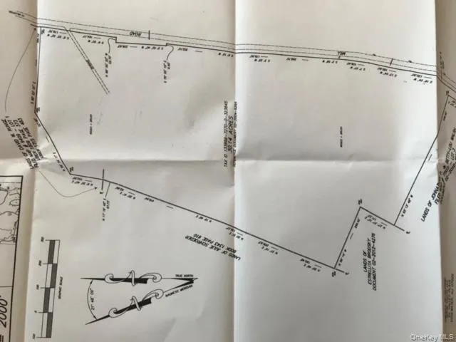 a bathroom with a shower and a shower