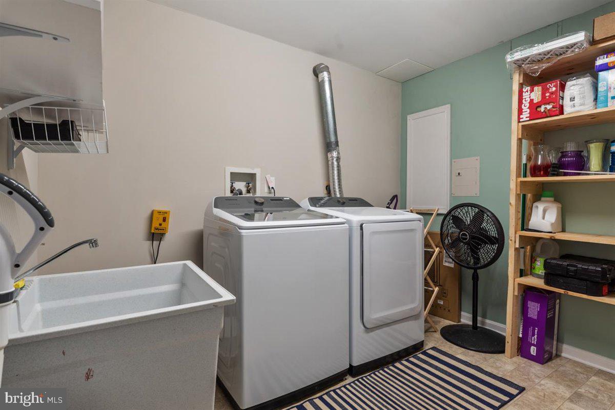 840 West Mount Harmony Road Owings, MD 20736 - Photo 29 of 38 Laundry room with sink