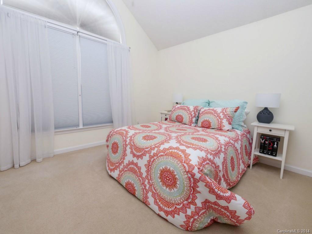 708 Monticello Drive Fort Mill, SC 29708 - Photo 14 of 22 a bedroom with a bed and a window