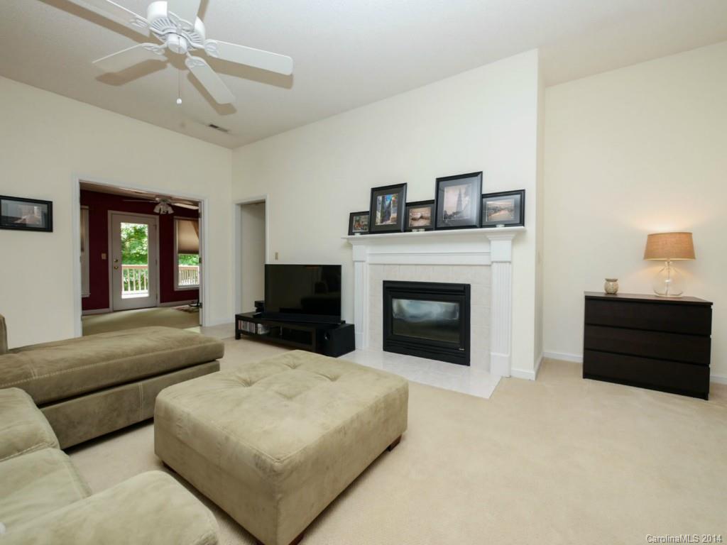 708 Monticello Drive Fort Mill, SC 29708 - Photo 3 of 22 a living room with furniture and a fireplace