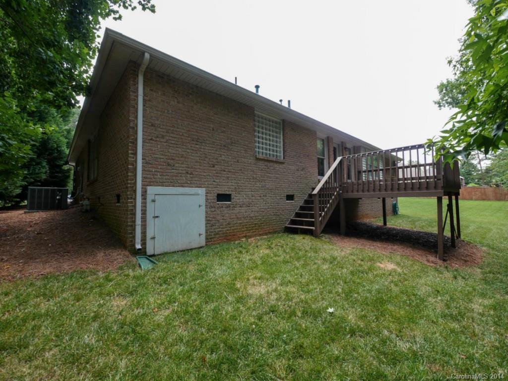 708 Monticello Drive Fort Mill, SC 29708 - Photo 22 of 22 a backyard of a house with lots of green space