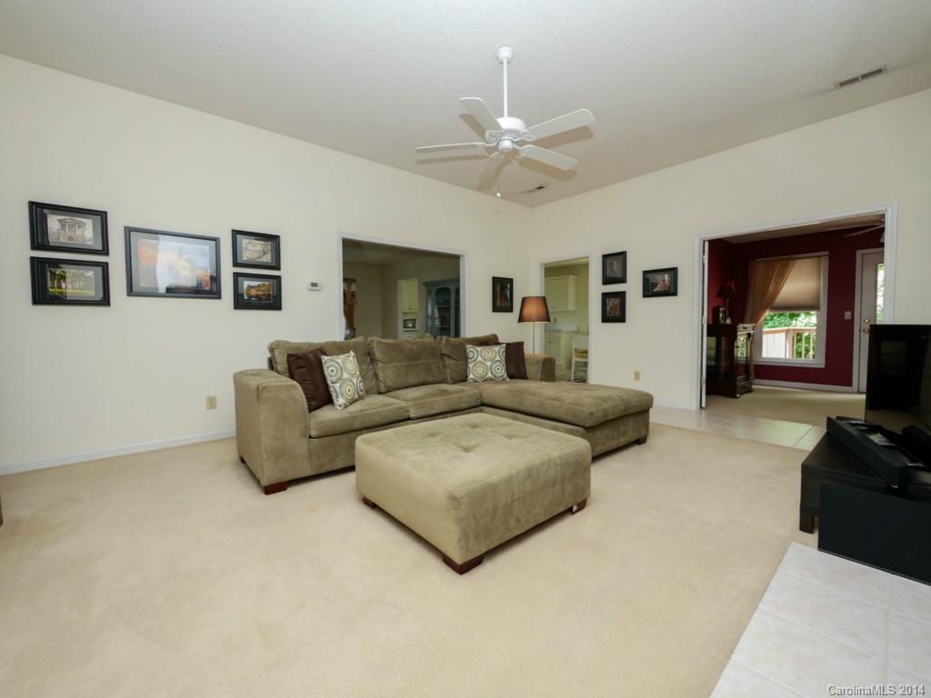 708 Monticello Drive Fort Mill, SC 29708 - Photo 6 of 22 a living room with furniture and a flat screen tv