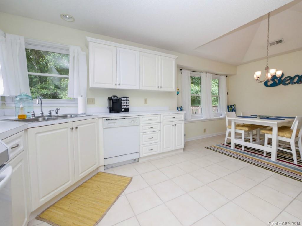 708 Monticello Drive Fort Mill, SC 29708 - Photo 9 of 22 a kitchen with cabinets and window